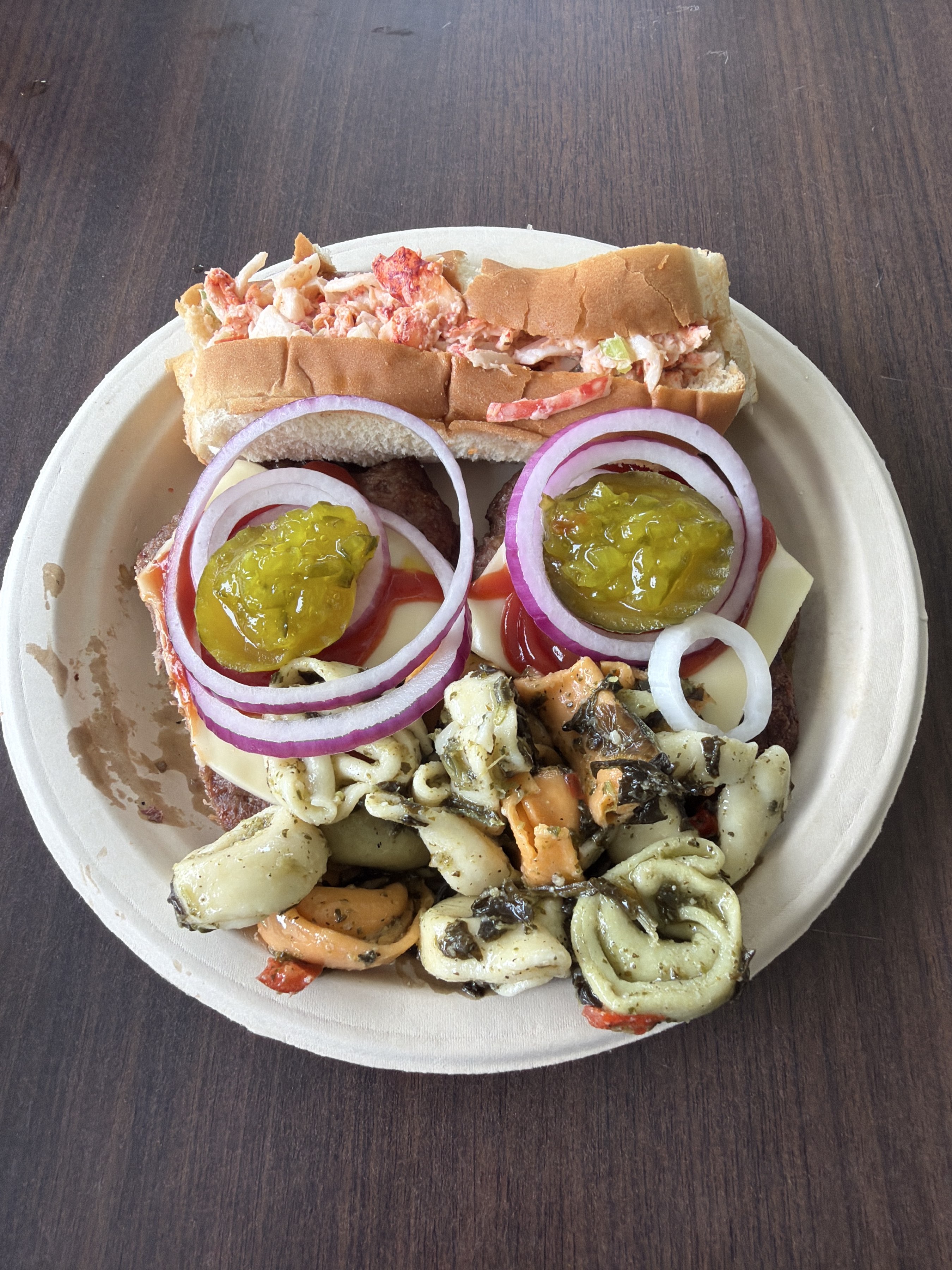 Burgers, Lobster Roll, and Pesto Salad at Emerald Court