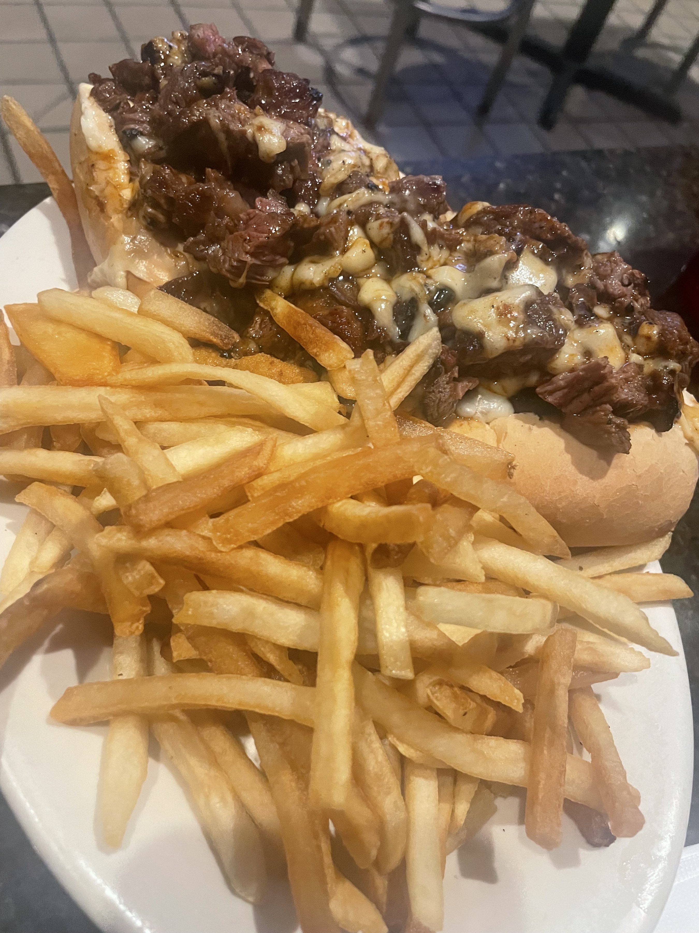 Steak tip & cheese sub w/ fries